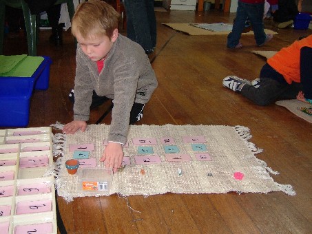 Ryan with the large moveable alphabet